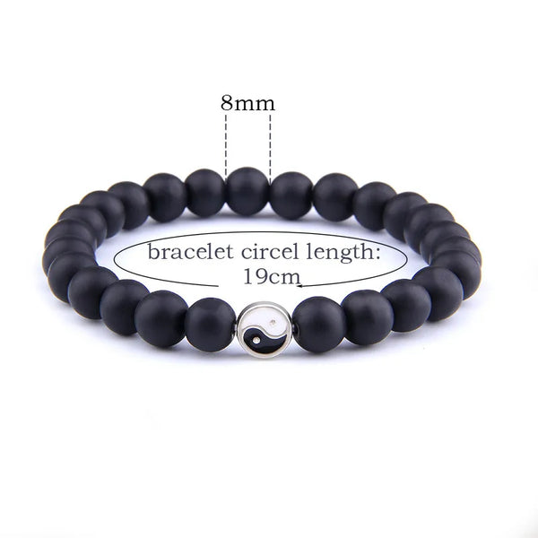 Black Yin Yang hand string bracelet with 19cm length and 8mm bead size.