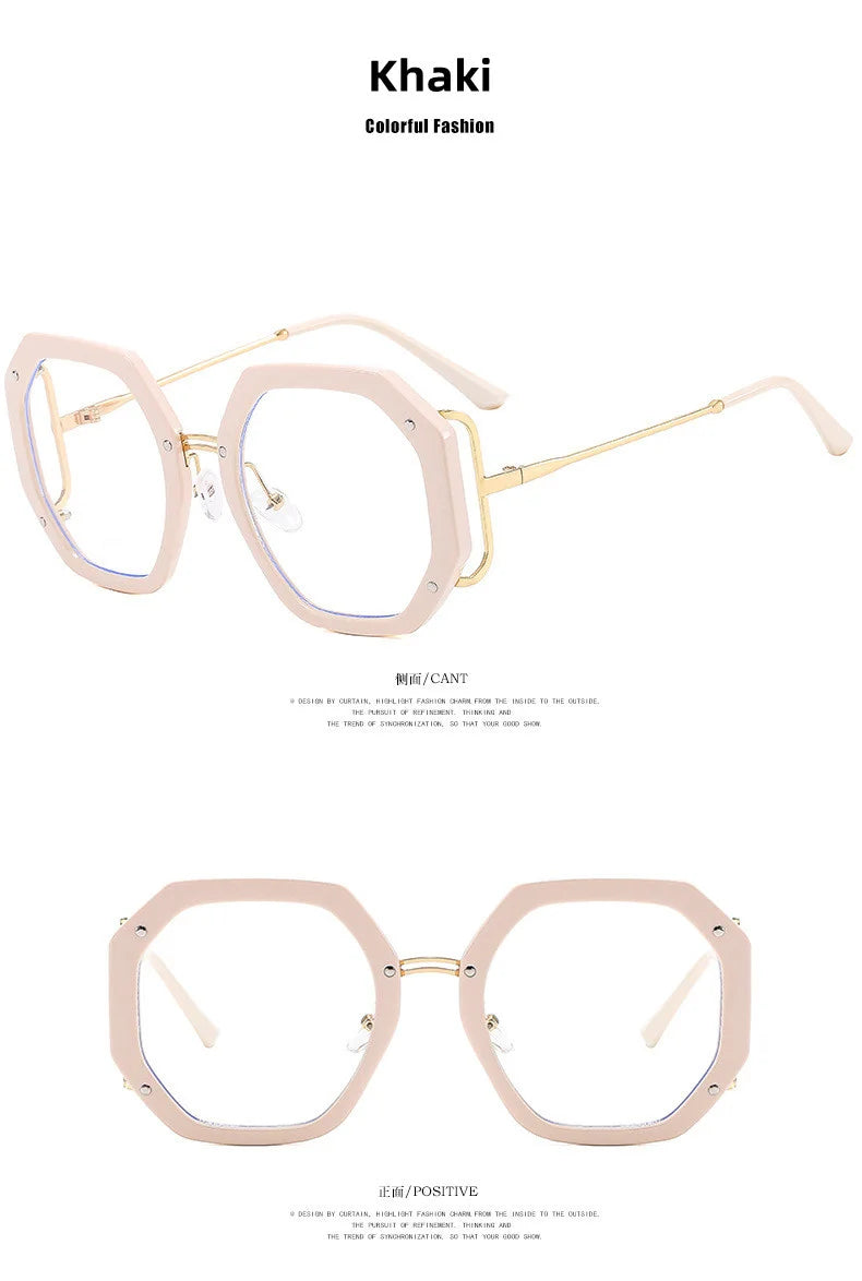 A pair of light pink khaki-colored eyeglasses frames with gold accents.