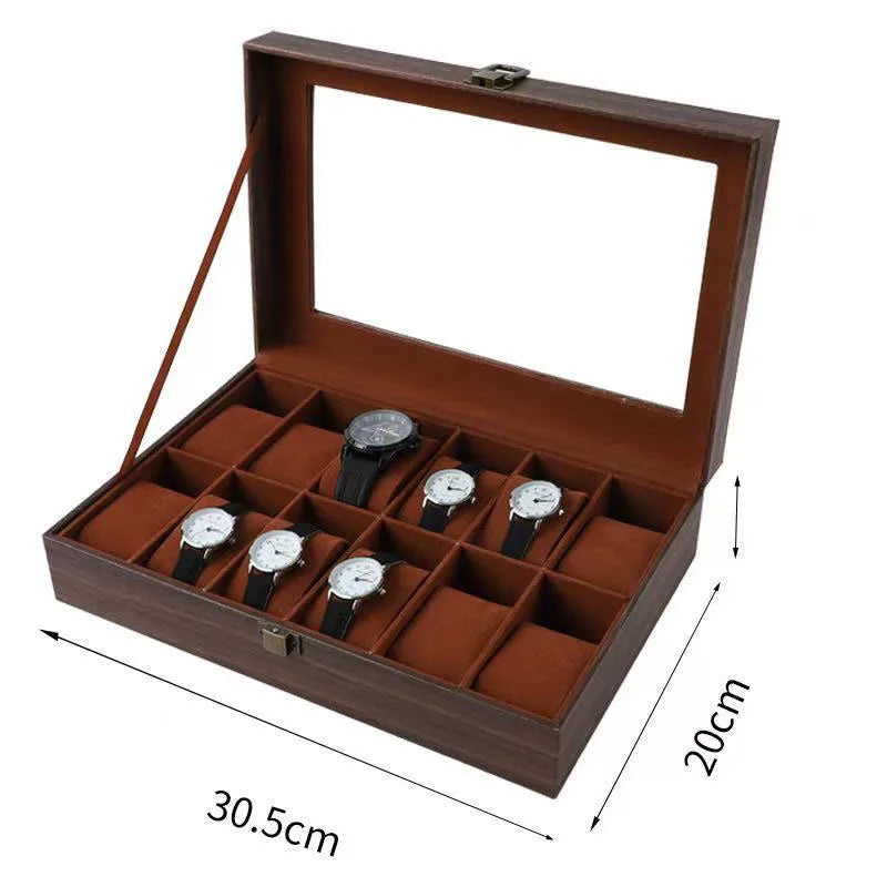 Rechteckige Holzschatulle zur Uhrenpräsentation mit verriegelbarem Deckel und braunen Lederfutterinsätzen.