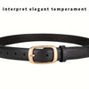 A black leather belt with a gold-toned buckle shown against a white background.