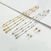 Gold and silver round metal beads sunglasses chain for eyewear displayed on a white background