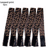 A set of five leopard print adjustable lace headbands for wigs and scarves.