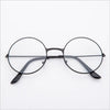 Un par de gafas redondas de metal negro anti-luz azul vistas desde el frente.