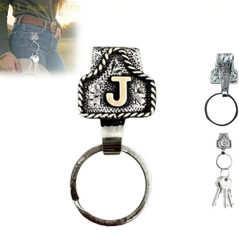 Silver letter J pendant on a belt keychain with a textured design