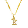 Gold chain necklace with a sparkling initial K pendant shaped like a crown