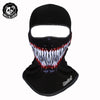 Black full face balaclava helmet liner featuring a striking red and white tiger-like facial pattern