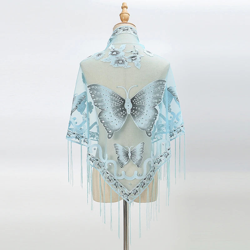 A light blue printed butterfly lace scarf shawl displayed on a mannequin.
