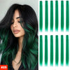 A woman models long, dark green hair extensions with vibrant teal tips.