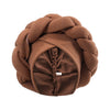 A brown braided turban cap made of fabric is shown in a round shape.