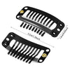 Black hair extension snap clips with a silver frame and gold accents shown from two angles.