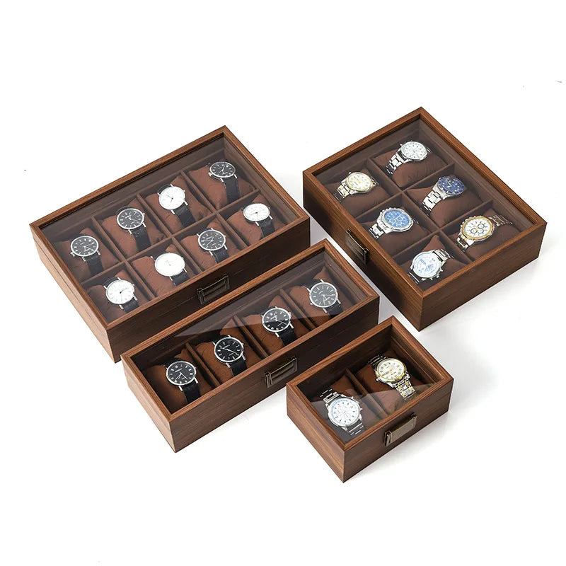 A wooden multi-slot display box featuring several watch and jewelry slots.