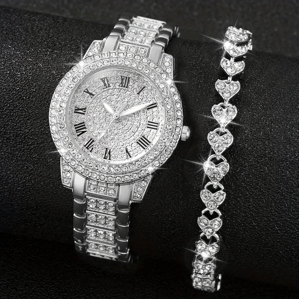 A silver rhinestone heart watch set featuring a wristwatch and a matching heart-shaped bracelet.