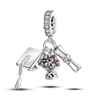 A sterling silver devil's eye charm featuring a textured pendant and a diamond-encrusted bail.