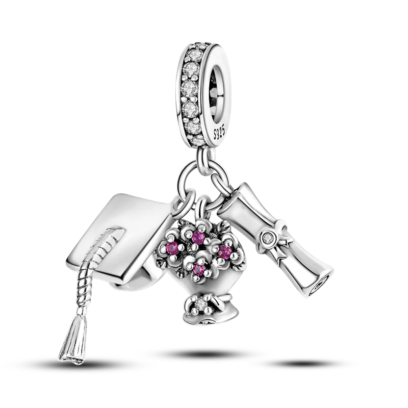 A sterling silver devil's eye charm featuring a textured pendant and a diamond-encrusted bail.