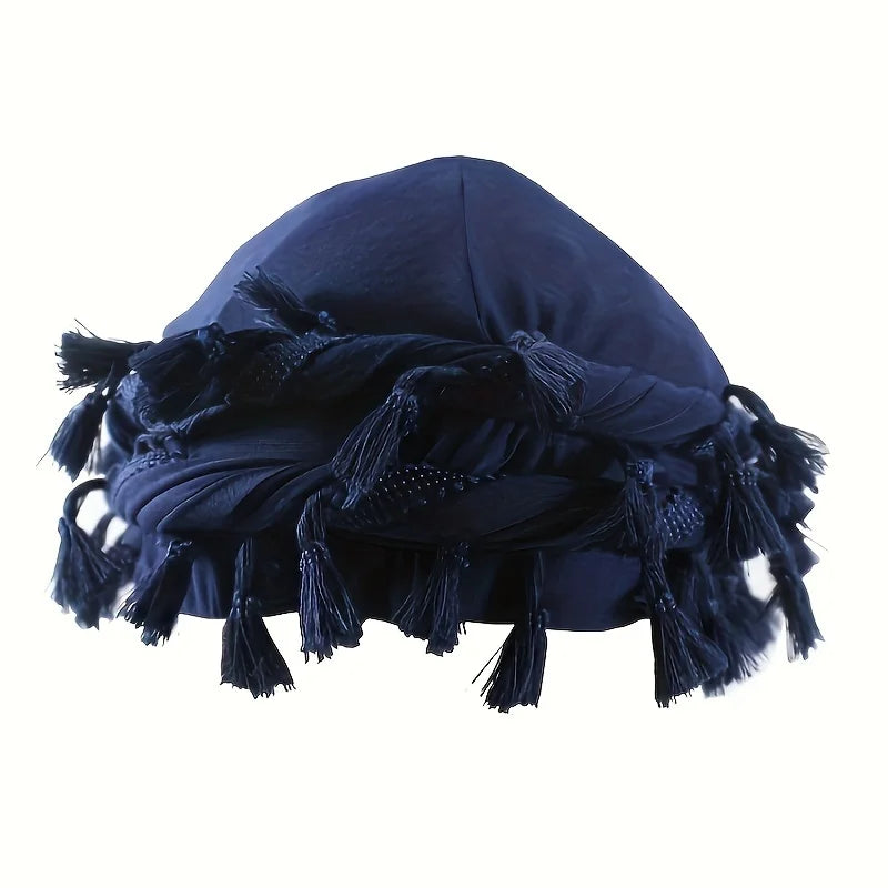 A dark navy stretch modal and satin turban head wrap with black fringe.