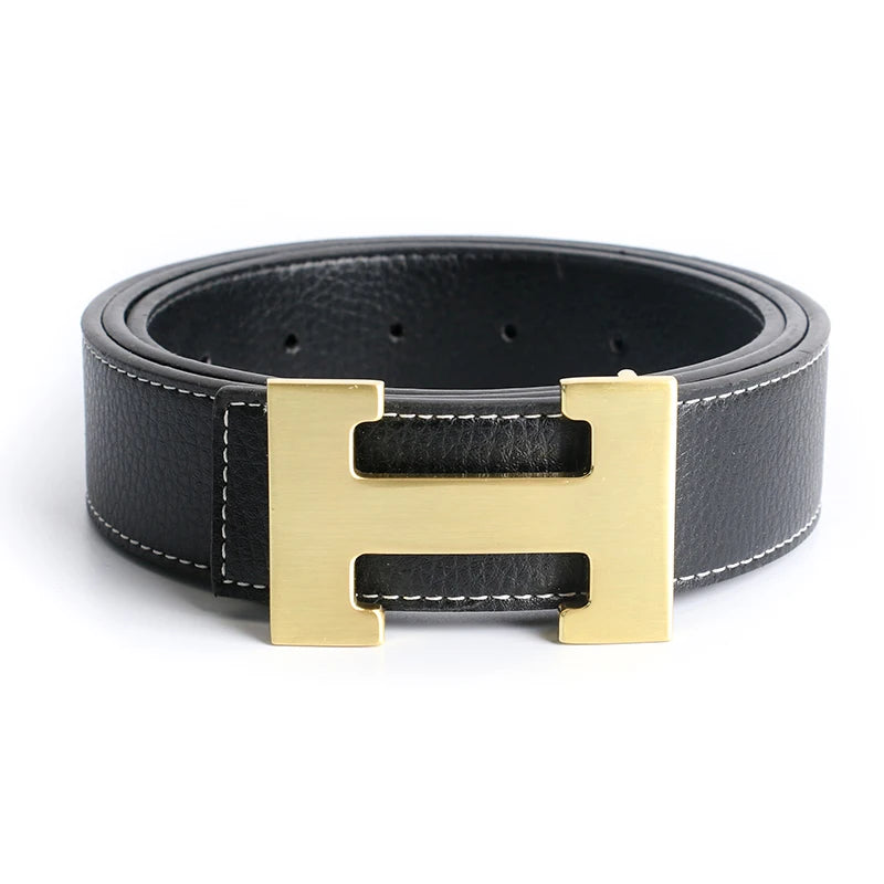 A black genuine leather dress belt with a gold-toned buckle.
