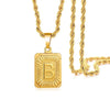 A gold-plated letter pendant necklace featuring a large, embossed letter B on a thick gold chain.