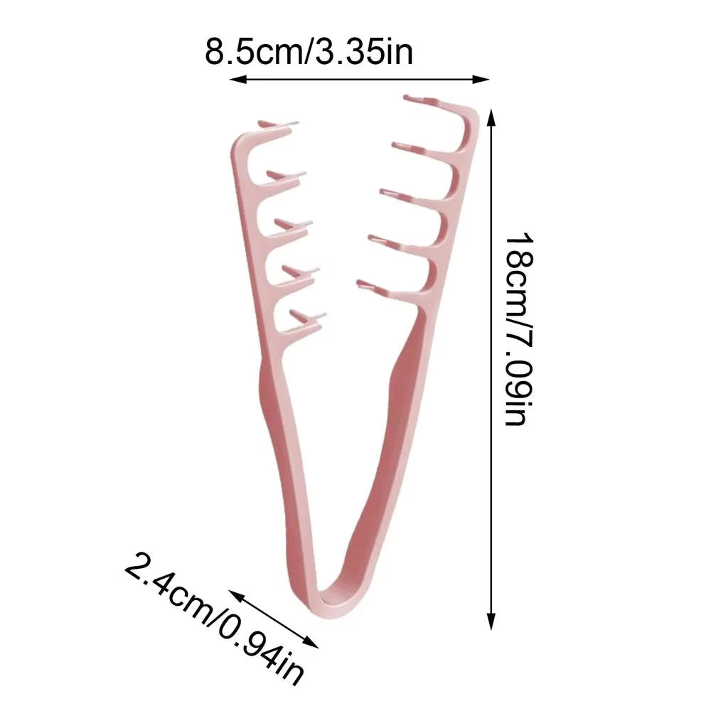 A pink volume boosting detangling hair comb shown with dimensions of 8.5cm/3.35in and 2.4cm/0.94in.