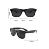 A pair of black vision correction pinhole glasses shown with dimensions.