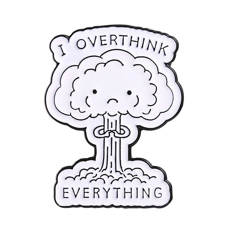 An enamel pin featuring a drawing of a sad, thought-clouded tree with the text I OVERTHINK Everything
