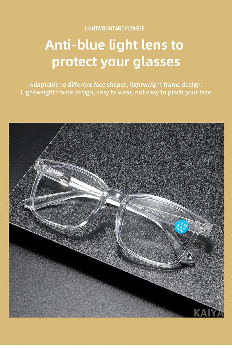 Gafas de lectura ligeras y claras anti-luz azul descansando sobre una superficie oscura.