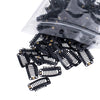A pile of black hair extension snap clips for wigs contained in a clear plastic bag.