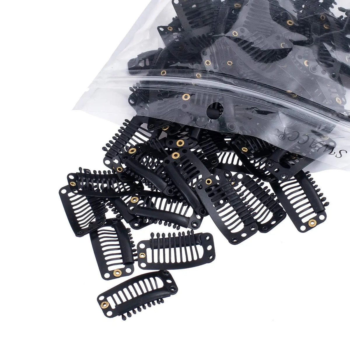 A pile of black hair extension snap clips for wigs contained in a clear plastic bag.