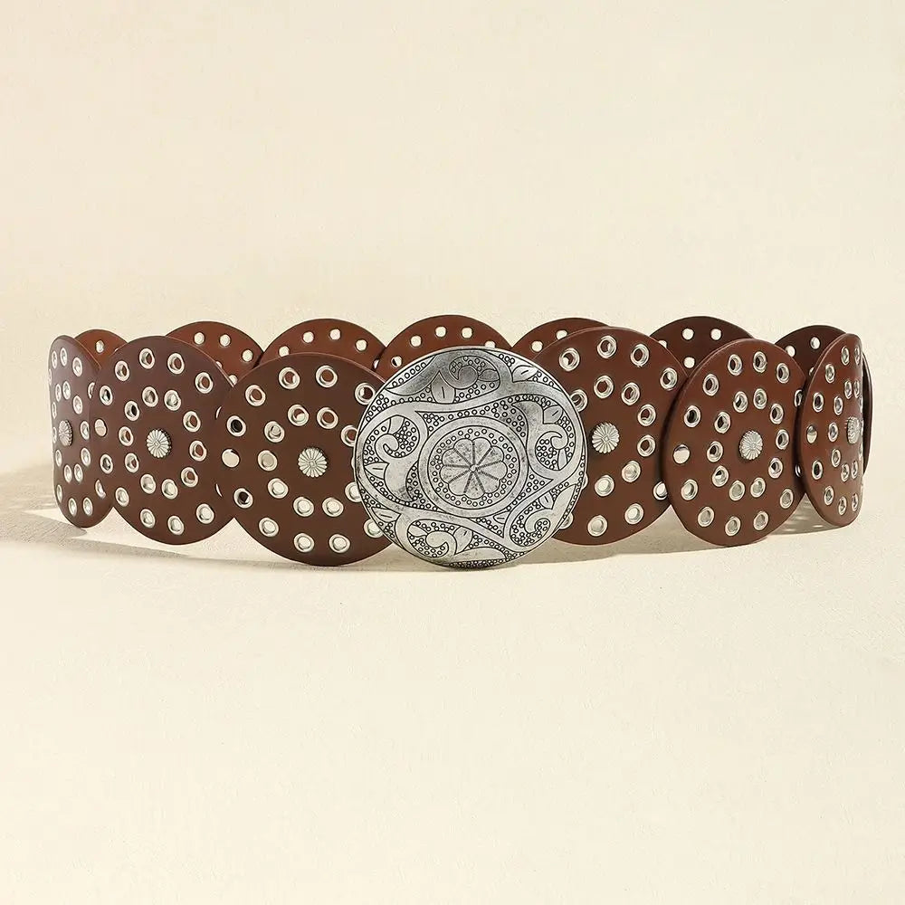 A collection of vintage brown PU disc belts with metal buckles arranged in a row.