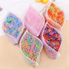 Pack of colorful disposable rubber hair ties for kids in pink and clear packaging