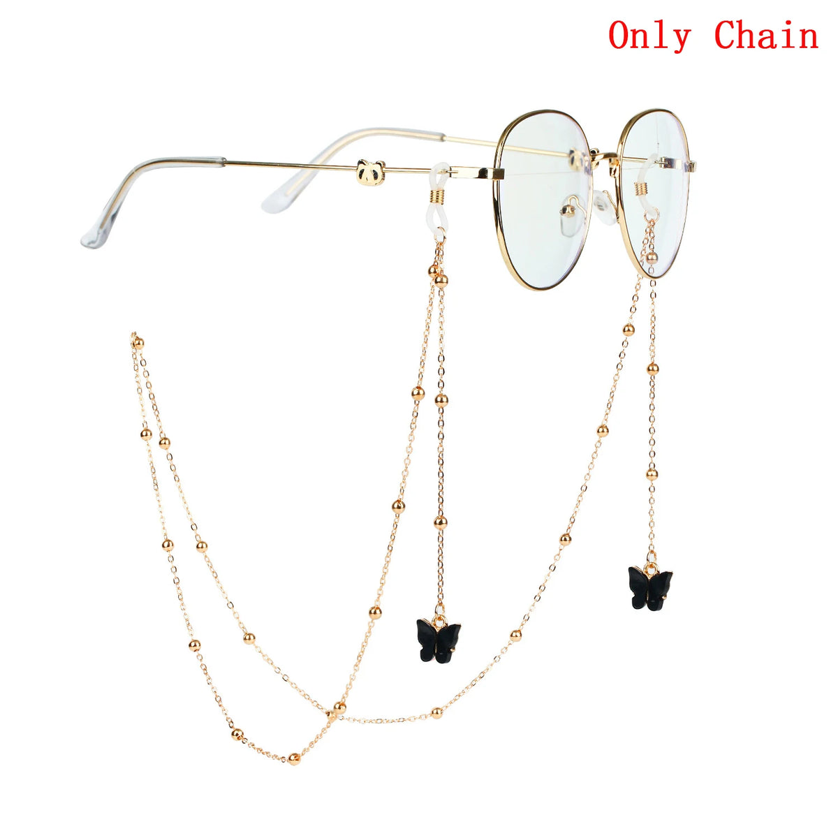 Gold chain necklace with butterfly pendants and round-framed glasses.