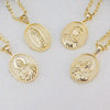 A set of three 14k gold plated pendants featuring the Virgin Mary and Christ figures on gold chains.