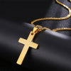 Goldene Edelstahlkreuz-Anhalskette auf dunkler Oberfläche.