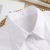 A close-up view of a white elegant detachable button-up collar shirt.