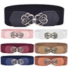 A collection of vintage leather elastic belts featuring brass rosette buckles in various colors like black, pink, white, maro
