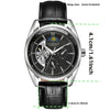 A black men's automatic wristwatch with a silver-toned case and black leather strap.