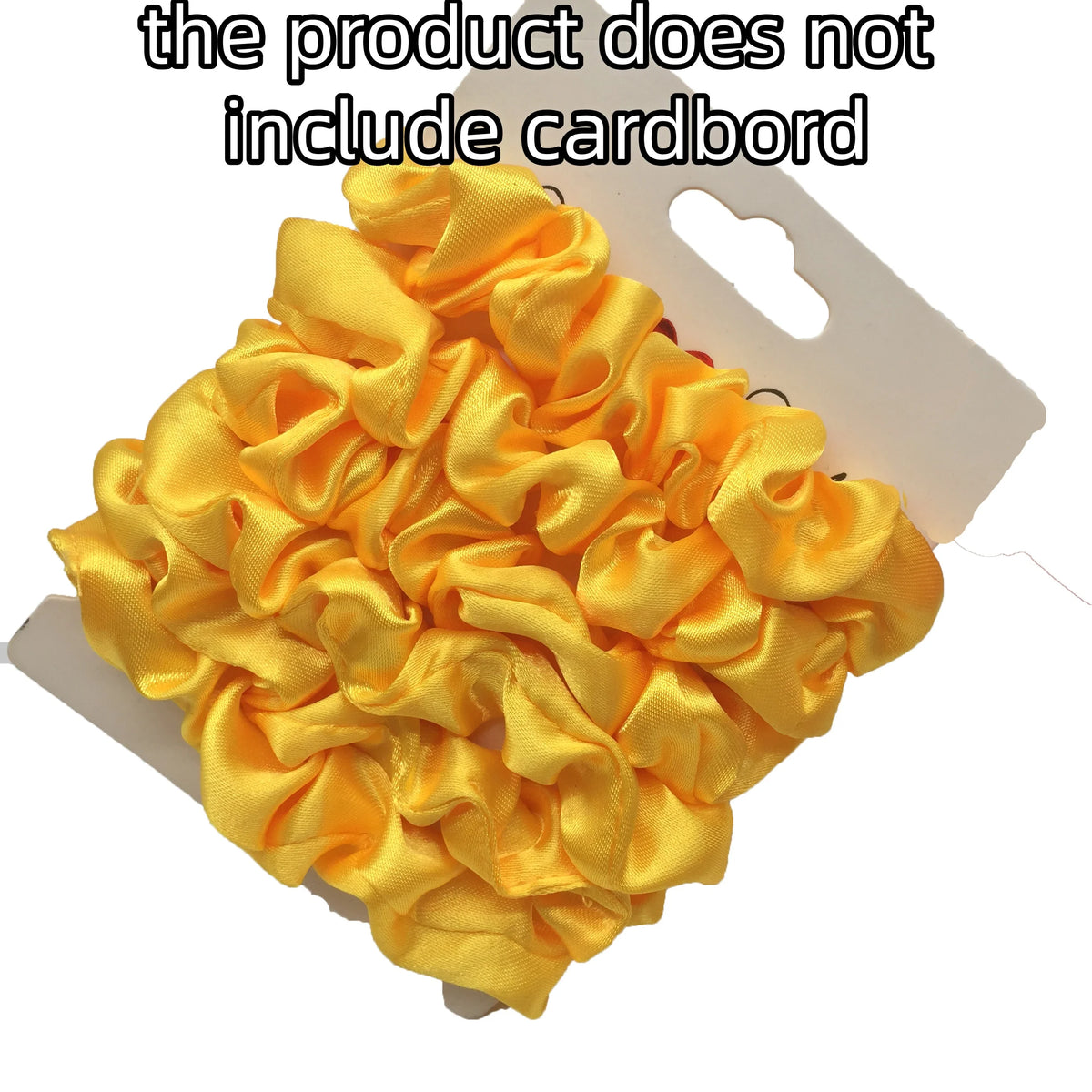 A pile of bright yellow satin hair scrunchies is shown on a white background.