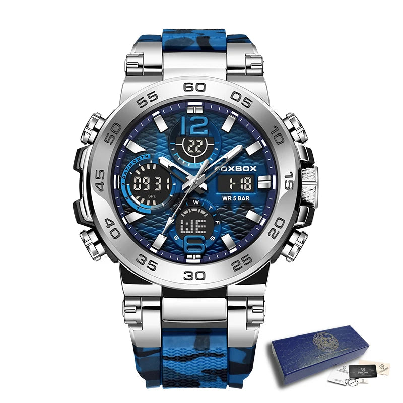 A silver and blue digital sports watch with a chronograph display on a black leather strap and box.