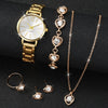 A set of elegant gold-toned quartz wrist watch and delicate gold chain necklace with diamond pendants.