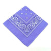 Purple bandana featuring white paisley and geometric patterns