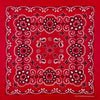 A red fabric with white embroidery featuring a detailed floral pattern.