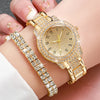 A gold steel quartz watch set featuring a wristwatch and a matching bracelet displayed on a hand.
