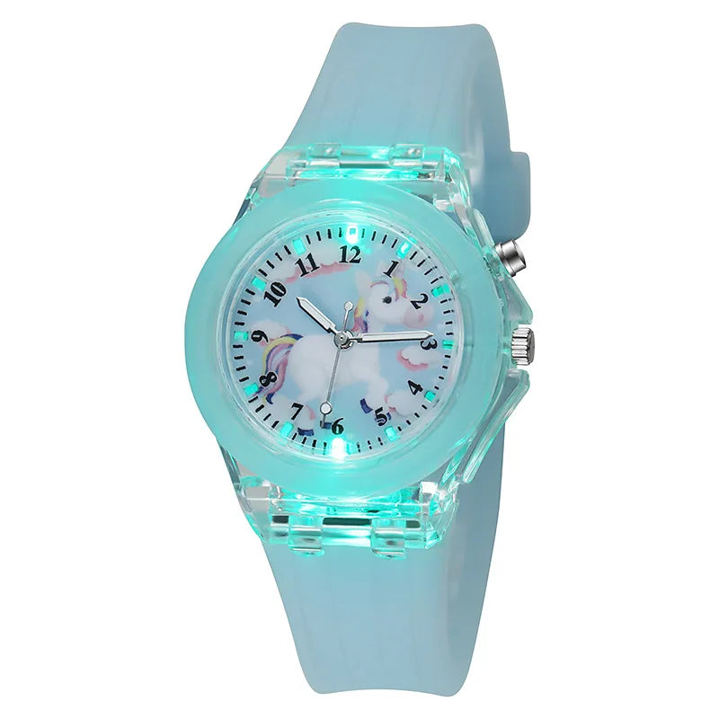 A light blue fashion watch with a clear crystal face featuring a unicorn design and glowing blue accents.