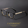 A pair of tortoiseshell retro square anti-blue light eyeglasses resting on a dark surface.
