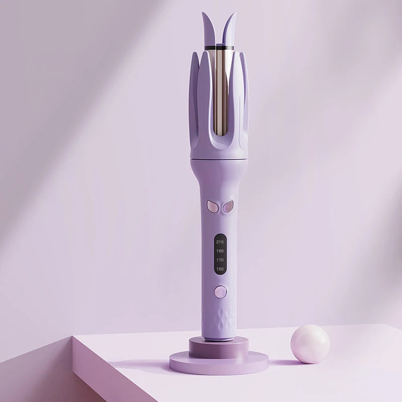 A purple professional automatic curling iron with a gold barrel and temperature control dial sits on a white surface.