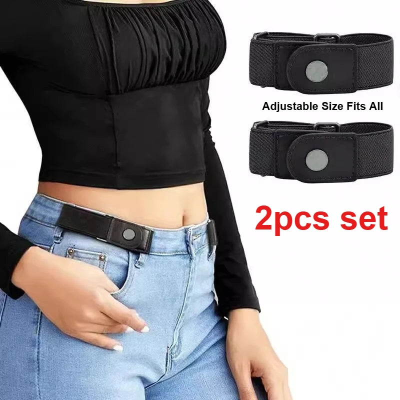 A set of two black buckle-free elastic casual belts shown on a person's waist area.