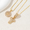 Gold-toned necklace set featuring crystal pendants shaped like the letter A and Z.