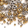 A collection of silver and gold stainless steel spacer beads for DIY jewelry making