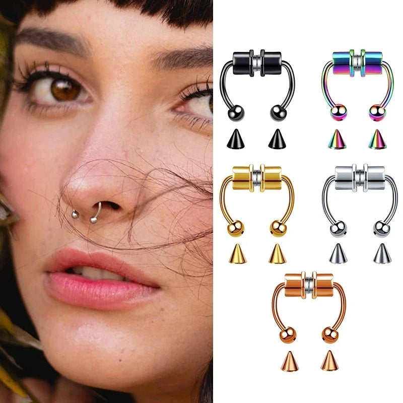 A close-up of a woman's face showing various gold and silver hoop nose rings and stud earrings.