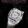 A close-up shot of a silver luminous calendar men's quartz watch with a clear crystal and metal band.