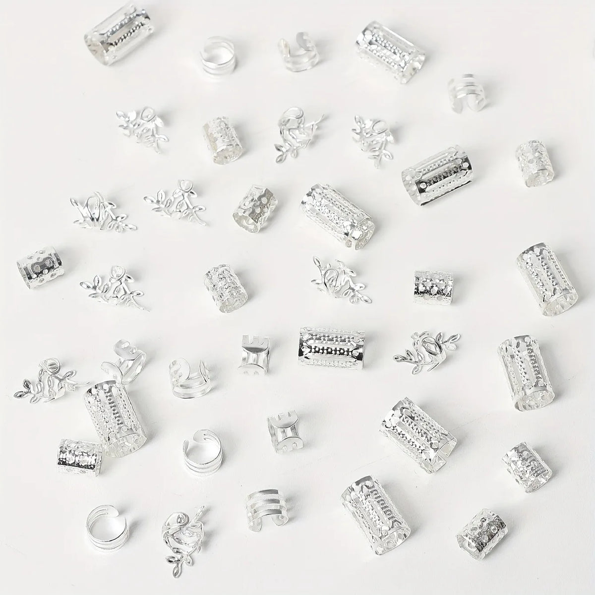 A collection of elegant hollow hair rings and decorative hair accessories for braids.